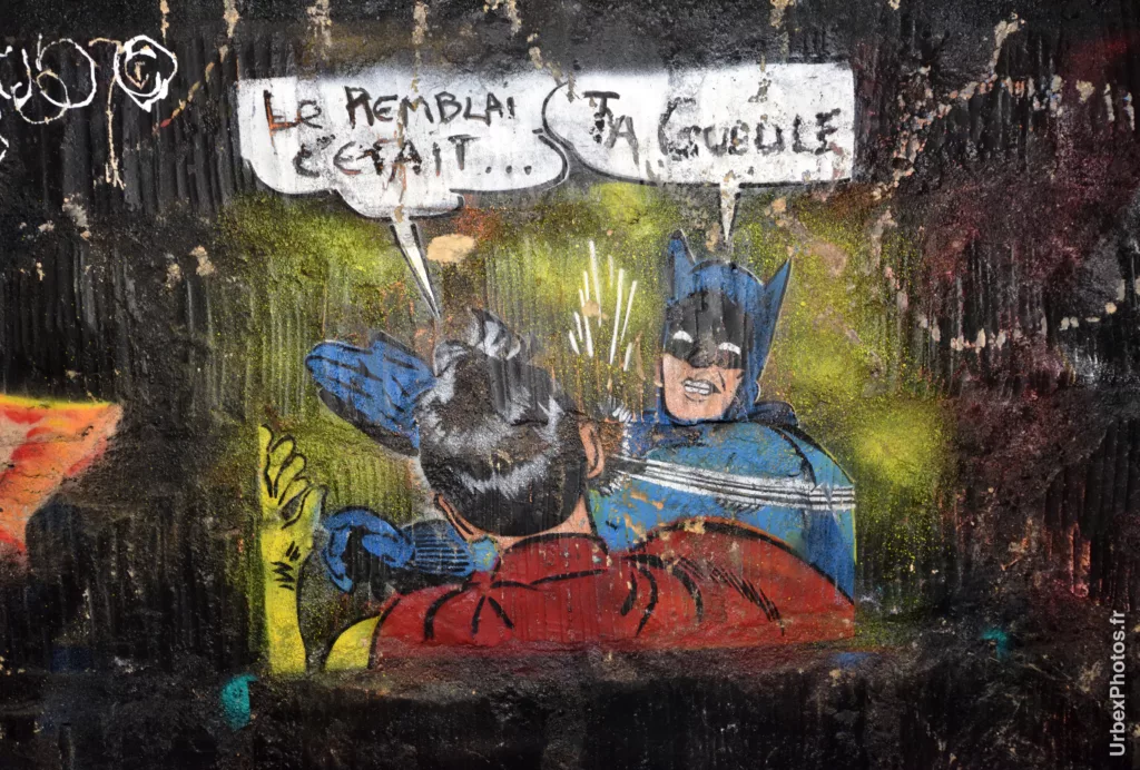 Graffiti du mème de Batman giflant Robin